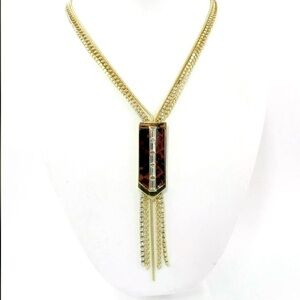 Guess Gold Tone Tassel Necklace with White Crystals